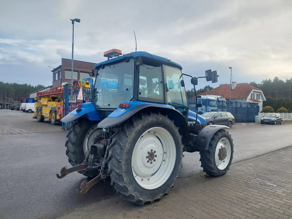 New Holland TL90 - Tracteur Agricole Robuste et Fiable - Cie meurthe mosellane matma