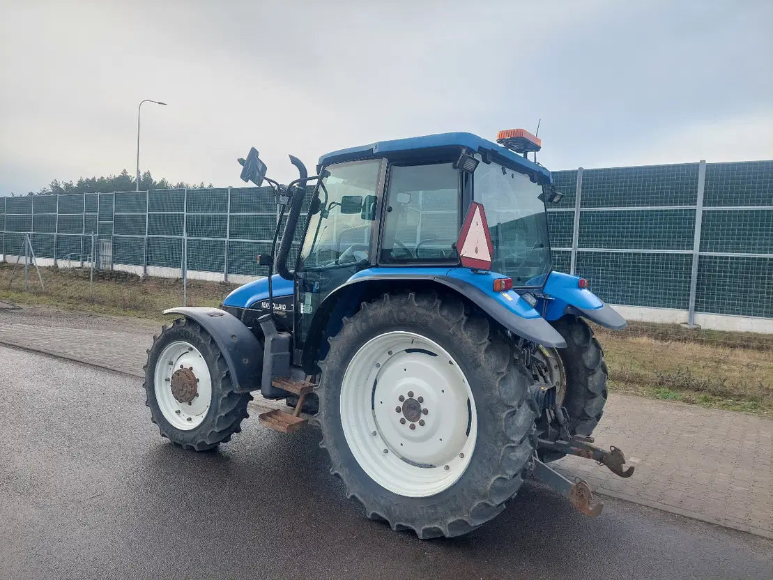 New Holland TL90 - Tracteur Agricole Robuste et Fiable - Cie meurthe mosellane matma